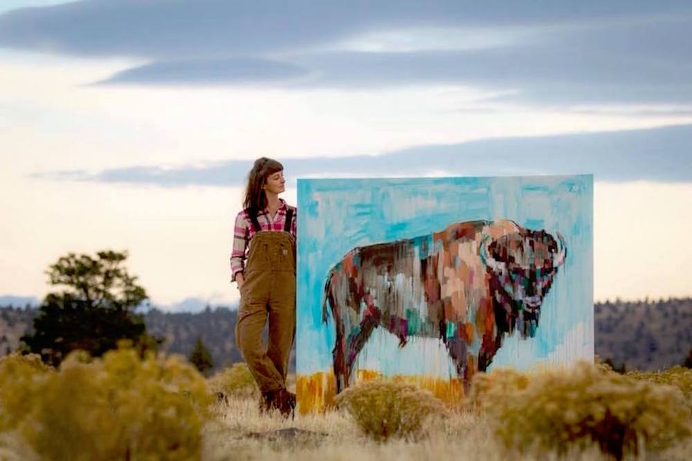 Sheila Dunn with Bison painting.  Credit: Ryder Redfield