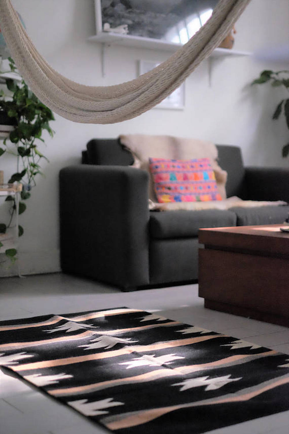 Black and Blush Wool Rug from Oaxaca – This rug is woven on a footloom by our artisan partners in Oaxaca, Mexico. The co-op focuses on job training for women, providing more opportunities in the community.